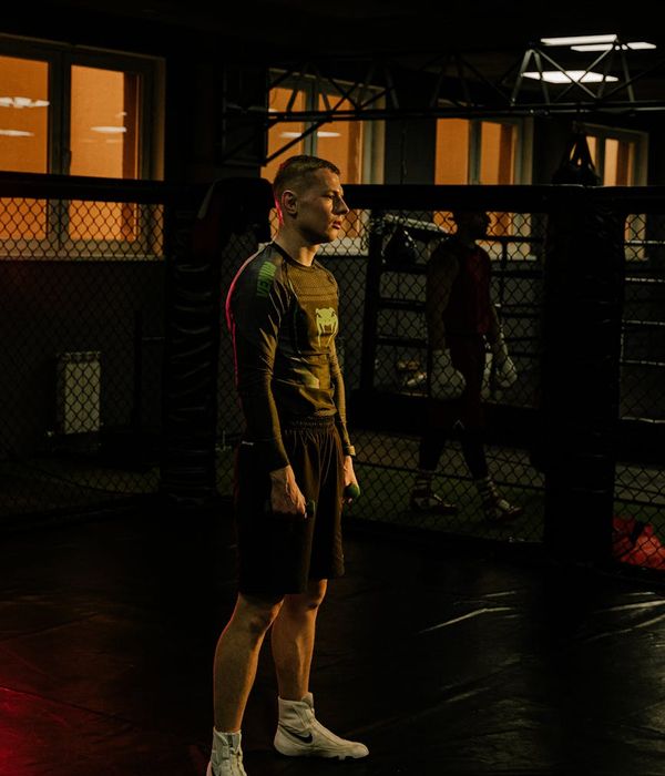 Comfortable workout clothes and a water bottle ready for a session.